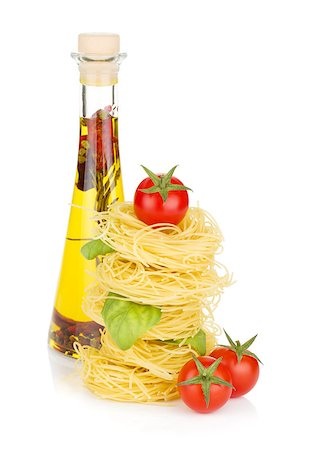 simsearch:400-06796273,k - Pasta, tomatoes, basil and olive oil. Isolated on white background Stock Photo - Budget Royalty-Free & Subscription, Code: 400-06796272