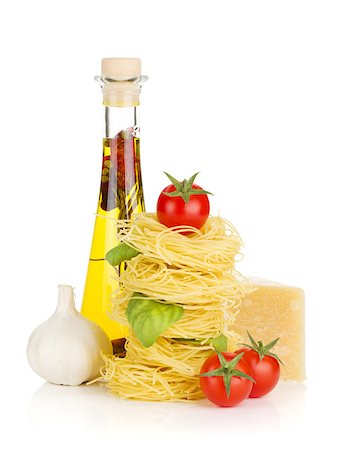 simsearch:400-06796273,k - Pasta, tomatoes, basil, olive oil, garlic and parmesan cheese. Isolated on white background Stock Photo - Budget Royalty-Free & Subscription, Code: 400-06796273