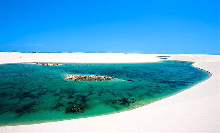 view of lagoa azul in desert white sand dunes of the Lencois Maranheses National Park in brazil Stock Photo - Budget Royalty-Free & Subscription, Code: 400-06797340