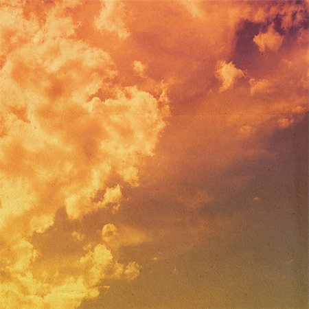 clouds on a textured vintage paper background, with grunge stains Foto de stock - Super Valor sin royalties y Suscripción, Código: 400-06798344