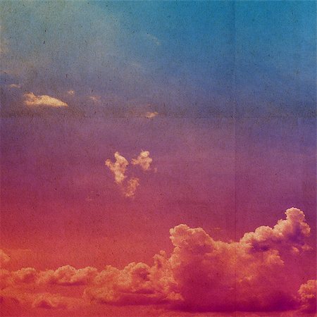 clouds on a textured vintage paper background, with grunge stains Foto de stock - Super Valor sin royalties y Suscripción, Código: 400-06798350