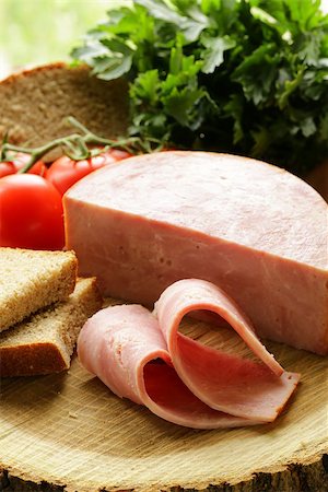 simsearch:400-06207145,k - large piece of ham on a cutting board stump Stock Photo - Budget Royalty-Free & Subscription, Code: 400-06798858