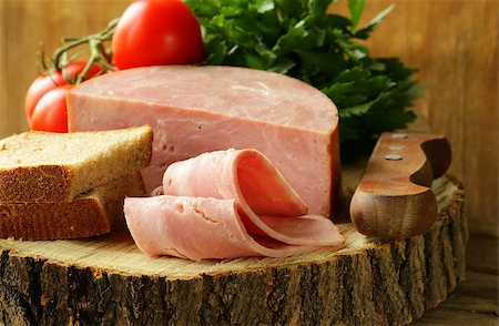 simsearch:400-06207145,k - large piece of ham on a cutting board stump Stock Photo - Budget Royalty-Free & Subscription, Code: 400-06798859