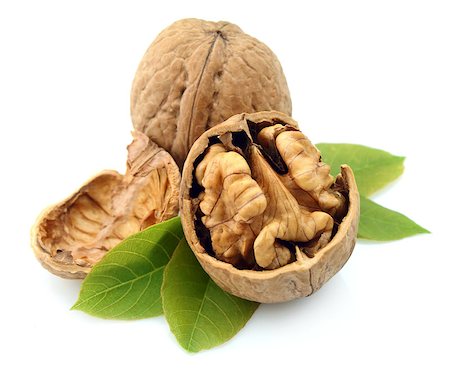 walnut with leaf close up Stock Photo - Budget Royalty-Free & Subscription, Code: 400-06799080