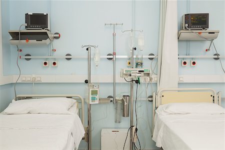 empty inside of hospital rooms - Two sterile beds in a hospital Stock Photo - Budget Royalty-Free & Subscription, Code: 400-06799490