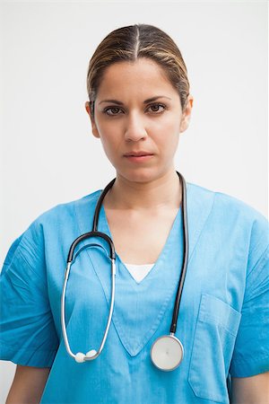 Nurse is looking into the camera disappointed Stock Photo - Budget Royalty-Free & Subscription, Code: 400-06799719