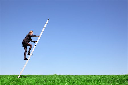 Young businesswoman climbs a ladder on green meadow and blue sky Stock Photo - Budget Royalty-Free & Subscription, Code: 400-06790749