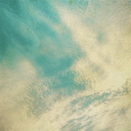 clouds on a textured vintage paper background, with grunge stains Foto de stock - Super Valor sin royalties y Suscripción, Código: 400-06792807