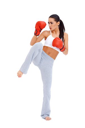 Full body shot of female kick boxer over white background Stock Photo - Budget Royalty-Free & Subscription, Code: 400-06847603
