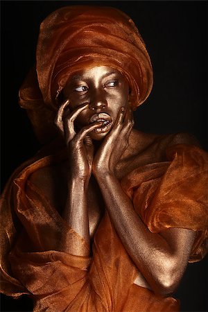 African Amercian Woman Painted With Gold Stock Photo - Budget Royalty-Free & Subscription, Code: 400-06856072