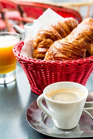 simsearch:400-05704519,k - Breakfast with coffee and croissants in a basket on table Stock Photo - Budget Royalty-Free & Subscription, Code: 400-06856191