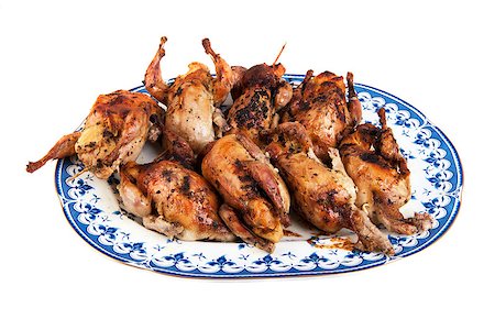 Big plate full of freshly roasted quails isolated on white Stock Photo - Budget Royalty-Free & Subscription, Code: 400-06856821