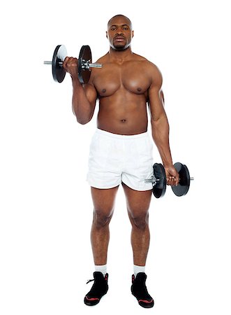 simsearch:400-06859193,k - Muscular man exercising with dumbbells isolated against white background Stock Photo - Budget Royalty-Free & Subscription, Code: 400-06859184