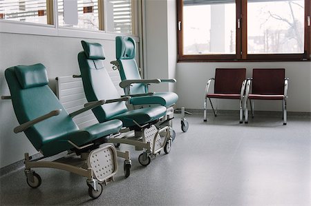 Three ergonomic empty chairs in the waiting room of a modern hospital station Stock Photo - Budget Royalty-Free & Subscription, Code: 400-06850354