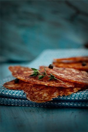 chorizo salami sausage on blue rustic background. Meat cold cuts. Stock Photo - Budget Royalty-Free & Subscription, Code: 400-06852709