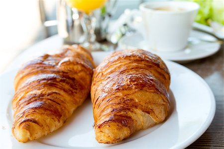 simsearch:400-05704519,k - Breakfast with coffee and croissants in a basket on table Stock Photo - Budget Royalty-Free & Subscription, Code: 400-06853478