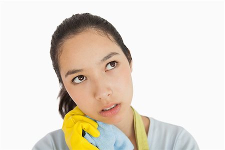 simsearch:400-06863660,k - Tired woman wearing rubber gloves clutching cleaning rag Stock Photo - Budget Royalty-Free & Subscription, Code: 400-06866418