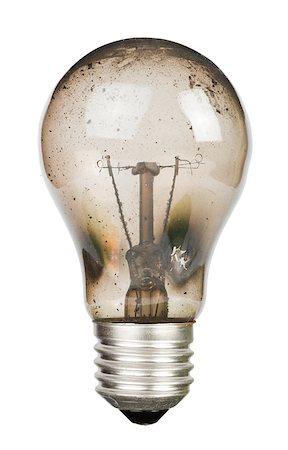 exploding electricity - Old burnt lamp smoked inside. White isolated Foto de stock - Super Valor sin royalties y Suscripción, Código: 400-06867850