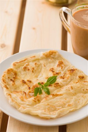 flaky - chapati traditional indian food with traditional items on background Stock Photo - Budget Royalty-Free & Subscription, Code: 400-06862303