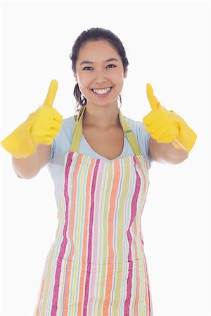 simsearch:400-06863660,k - Happy woman giving thumbs up in rubber gloves and apron Stock Photo - Budget Royalty-Free & Subscription, Code: 400-06863554