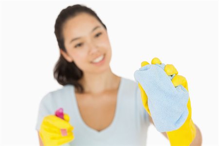 Woman cleaning a window on a white background Stock Photo - Budget Royalty-Free & Subscription, Code: 400-06863737