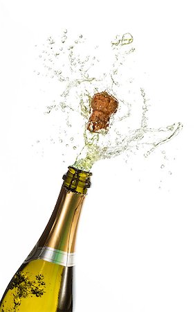 Bottle of champagne popping on white background Stock Photo - Budget Royalty-Free & Subscription, Code: 400-06874732