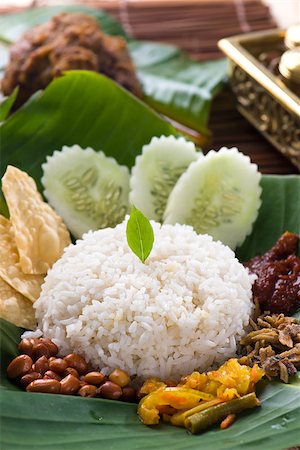 simsearch:400-07418409,k - nasi lemak, a traditional malay curry paste rice dish served on a banana leaf Stock Photo - Budget Royalty-Free & Subscription, Code: 400-06874821