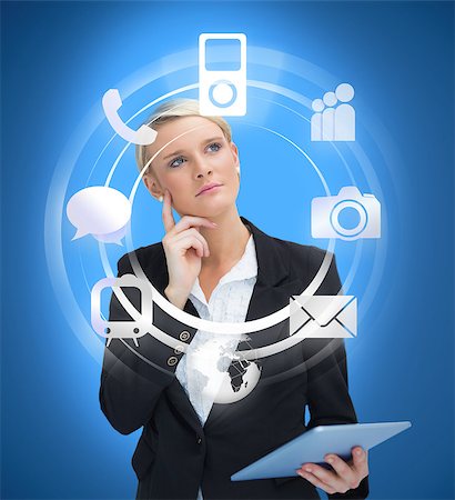 simsearch:6109-06685044,k - Businesswoman with tablet pc considering various applications on bright blue background Stock Photo - Budget Royalty-Free & Subscription, Code: 400-06876594