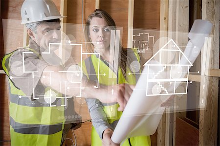 Architect and foreman looking at the plans on interface hologram in white Stock Photo - Budget Royalty-Free & Subscription, Code: 400-06877800
