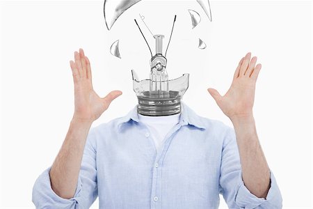 exploding light bulb - Man raising his hands and having a light bulb instead of head Stock Photo - Budget Royalty-Free & Subscription, Code: 400-06878578