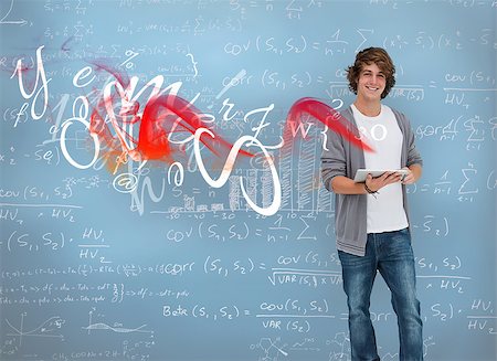 Student posing in front of chalk board in a classroom Stock Photo - Budget Royalty-Free & Subscription, Code: 400-06878682