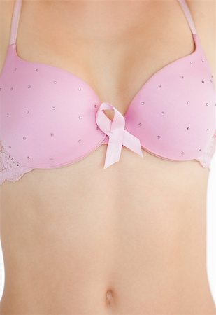 simsearch:400-07835111,k - Closeup of woman in bra with breast cancer awareness ribbon Stock Photo - Budget Royalty-Free & Subscription, Code: 400-06870725