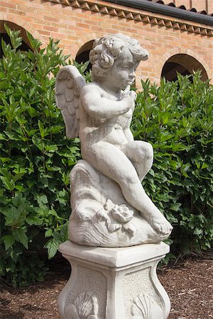 Cherub Tuscan Renaissance Cast Stone Garden Statuary Portrait Stock Photo - Budget Royalty-Free & Subscription, Code: 400-06886859
