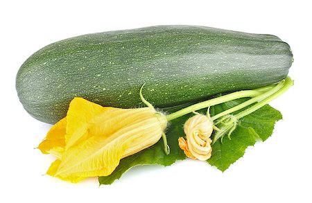 simsearch:400-04211564,k - fresh zucchini with green leaves and flower isolated on white background Photographie de stock - Aubaine LD & Abonnement, Code: 400-06887580