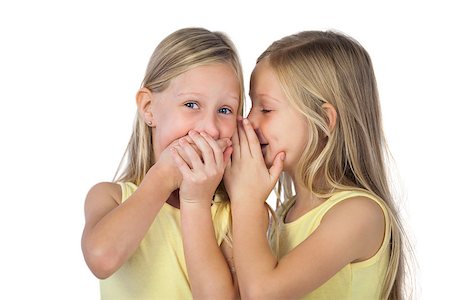 pictures of a little girl whispering - Little girl whispering to her sister on a white background Stock Photo - Budget Royalty-Free & Subscription, Code: 400-06889018