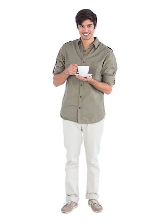 Happy man holding cup of coffee on a white background Stock Photo - Budget Royalty-Free & Subscription, Code: 400-06889118