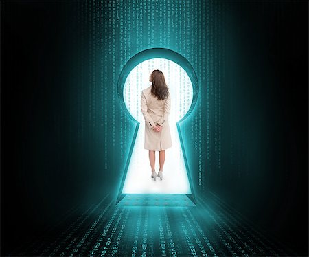 Businesswoman standing in keyhole door in blue and black matrix Stock Photo - Budget Royalty-Free & Subscription, Code: 400-06882691