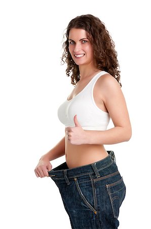 simsearch:400-06915547,k - Woman seeing results from her diet and giving a thumbs up, isolated in white Foto de stock - Super Valor sin royalties y Suscripción, Código: 400-06918268