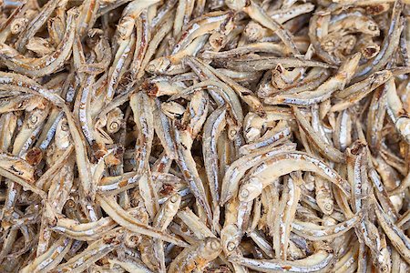 edible picture of fish - Whitebait on the market counter - edible anchovies background Stock Photo - Budget Royalty-Free & Subscription, Code: 400-06919519