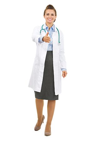 Full length portrait of smiling doctor woman stretching hand for handshake Stock Photo - Budget Royalty-Free & Subscription, Code: 400-06924678