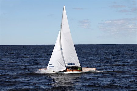 sailing yacht during the race side view Stock Photo - Budget Royalty-Free & Subscription, Code: 400-06925248