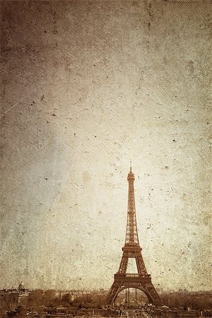 Retro Eiffel Tower (nickname La dame de fer, the iron lady),The tower has become the most prominent symbol of both Paris and France Stock Photo - Budget Royalty-Free & Subscription, Code: 400-06925612