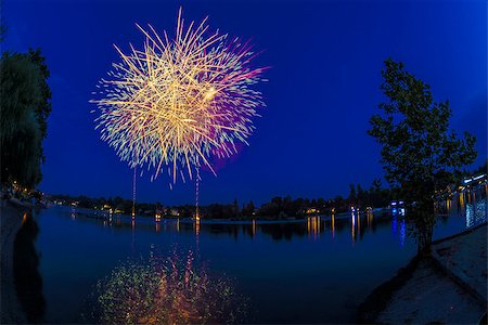 silhouette of firework - Fireworks on the river Ticino in a summer evening, Sesto Calende - Varese Stock Photo - Budget Royalty-Free & Subscription, Code: 400-06927689