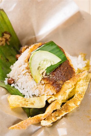 simsearch:400-07418409,k - A pack of nasi lemak (Malaysia National Dish) on dining table ready to eat. Stock Photo - Budget Royalty-Free & Subscription, Code: 400-06927751