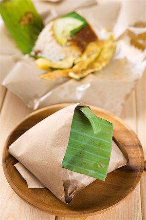 simsearch:400-07418409,k - Nasi lemak - traditional Malaysian breakfast on banana leaf Stock Photo - Budget Royalty-Free & Subscription, Code: 400-06927753