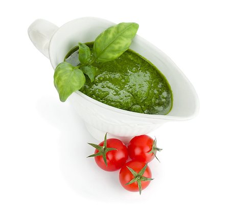 simsearch:400-06796273,k - Pesto sauce and cherry tomatoes. View from above. Isolated on white background Stock Photo - Budget Royalty-Free & Subscription, Code: 400-06920141