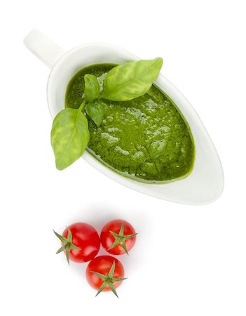 simsearch:400-06796273,k - Pesto sauce and cherry tomatoes. View from above. Isolated on white background Stock Photo - Budget Royalty-Free & Subscription, Code: 400-06920142