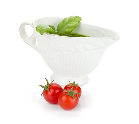 simsearch:400-06796273,k - Three cherry tomatoes and pesto sauce. Isolated on white background Stock Photo - Budget Royalty-Free & Subscription, Code: 400-06920143