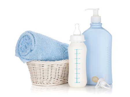 simsearch:400-06751007,k - Baby milk bottle, pacifier, shampoo and towel. Isolated on white background Stock Photo - Budget Royalty-Free & Subscription, Code: 400-06922291