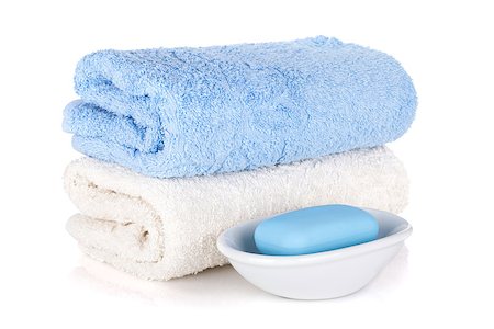 Soap and two towels. Isolated on white background Photographie de stock - Aubaine LD & Abonnement, Code: 400-06922402